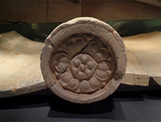 Convex roof-end tiles with a lotus design
